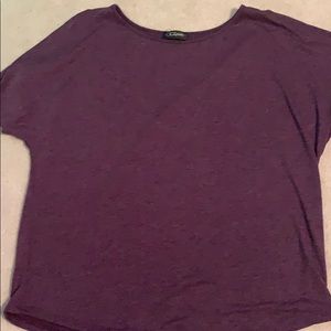 Colette Romey cold shoulder knit top